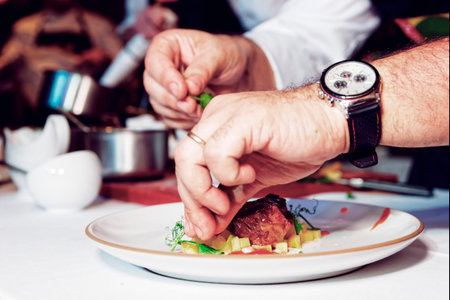 Chef is cooking a meat dish, toned image