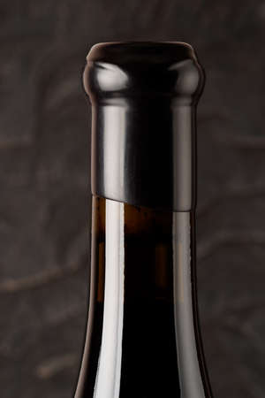 Neck of wine bottle sealed with waxの写真素材
