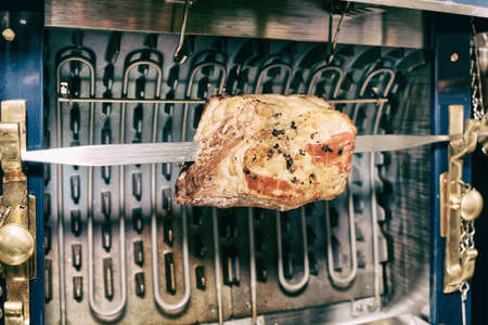 Pork ribs cut on old style electric grill, toned imageの写真素材