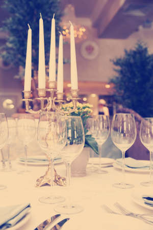 Table setting in an expensive restaurant, toned imageの写真素材
