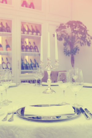 Place setting in an expensive restaurant, toned image