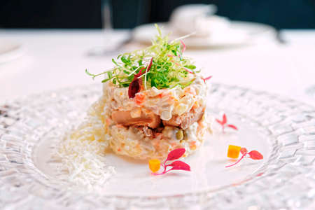 Russian salad cooked in a modern way, toned imageの写真素材