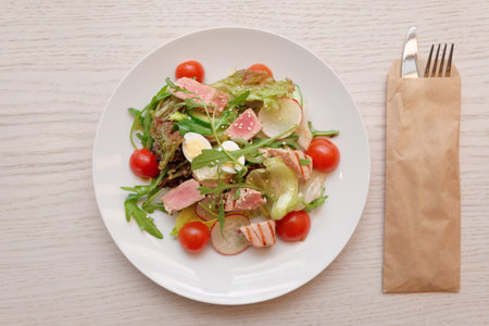Nicoise tuna salad in fast food restaurant shot from aboveの写真素材