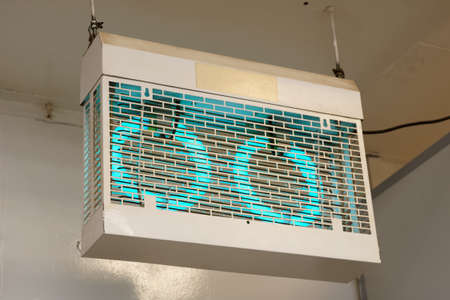 Ultraviolet lamp used to attract and kill flying insects used on food processing plants, in restaurants etcの写真素材
