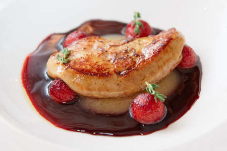 Grilled foie gras with red port sauce, close-upの写真素材