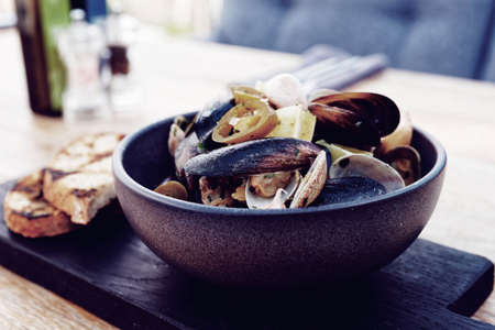 Shellfish sautee with hot jalapeno chili pepper, toned imageの写真素材