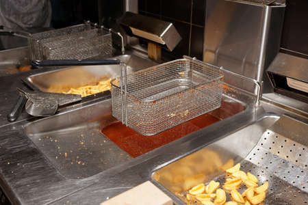 Deep fryer in commercial kitchen, fast food restaurantの写真素材