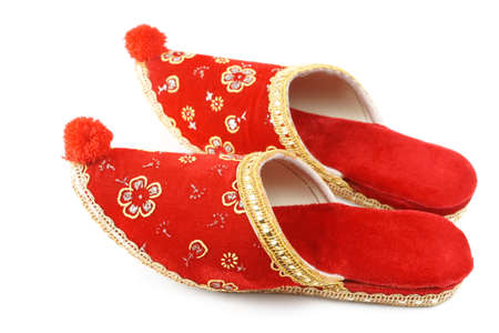 Traditional Turkish slippers, decorative footwear, isolated on white backgroundの写真素材
