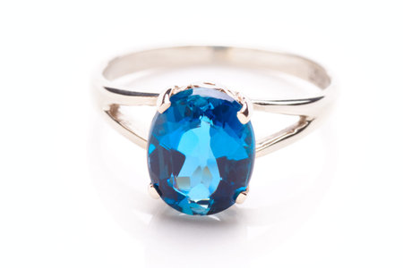 Ring with topaz isolated on white backgroundの写真素材