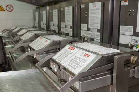 Deep fryer on restaurant kitchen, trademarks removed