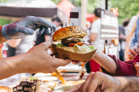 Delicious fresh burger on food market, ready to eat. Close-up.の写真素材