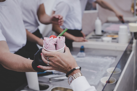 Delicious ice cream rolls at street food market, ready to eat. With copy spaceの写真素材