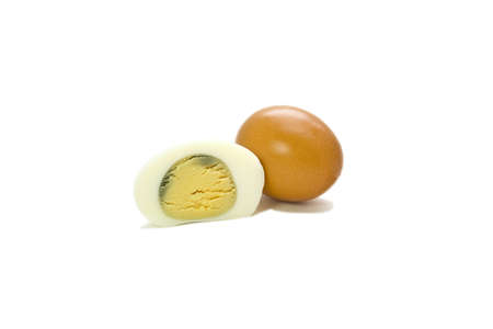 Egg and boiled egg isolated on white backgroundの写真素材