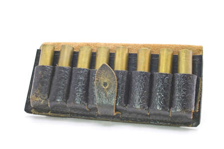The old ammunition belt, the cartridge, isolated on white backgroundの写真素材