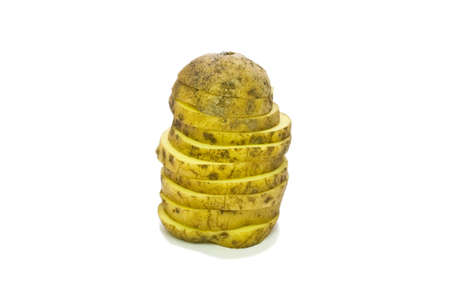 Potatoes, cut into slices, isolated on white backgroundの写真素材