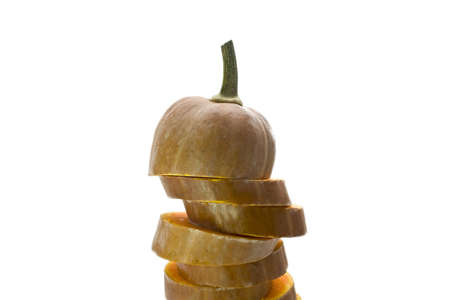 Pumpkin, cut into slices, macro, isolated on white backgroundの写真素材