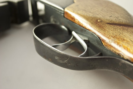 Metal hammers rifle close up