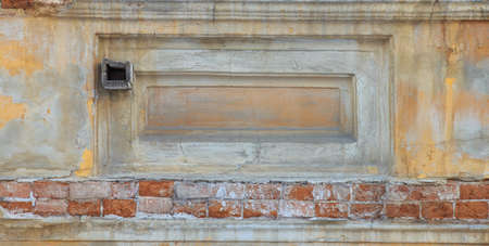 Texture of old brick wall on the streetの写真素材