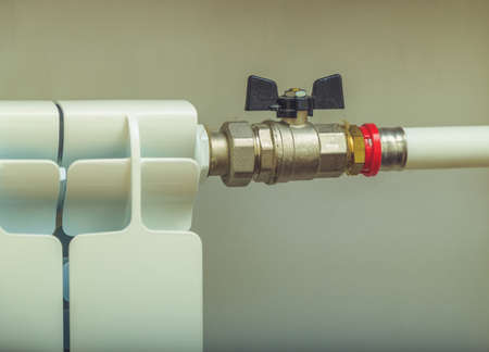 hot water pipe and radiator close upの写真素材