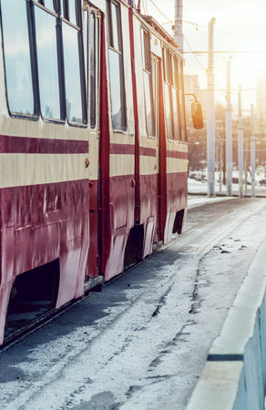 tram on a bridge in winter close-up