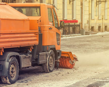 Snow removal vehicles in the street in winterの写真素材