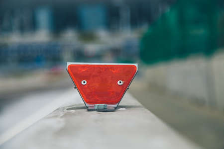 warning reflectors on the barrier close upの写真素材