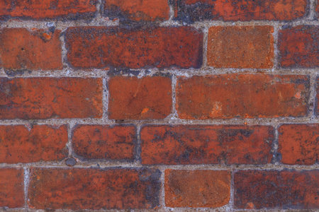 Texture of old brick wall close up