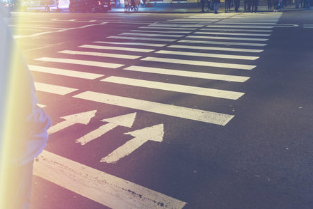 Pedestrian crossing at night in St Petersburg. Toned