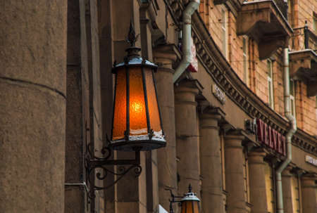 antique lantern on the facade of the buildingの写真素材