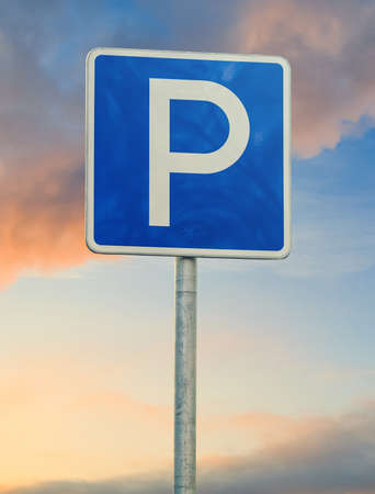 parking sign close up on sky backgroundの写真素材