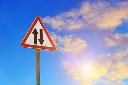 two way traffic road sign close up