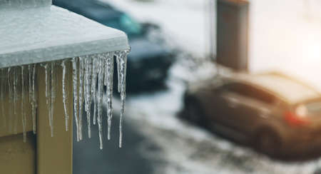 icicles on the facade of a close-upの写真素材