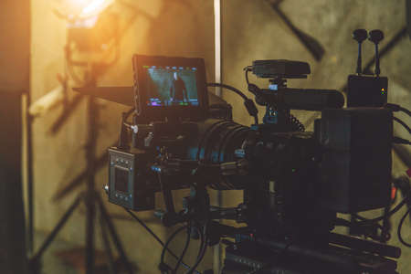 the movie camera shoots on the set close upの写真素材
