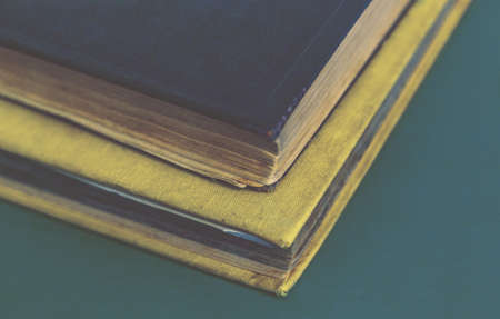 several ancient books close-up on each otherの写真素材