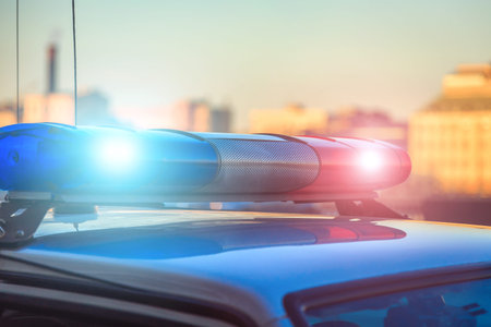 the police car on the street close up