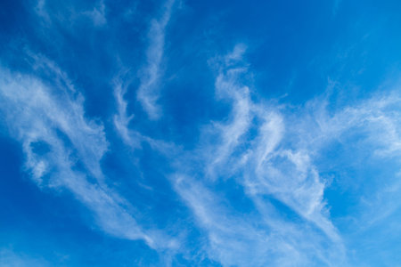 white clouds on a blue day sky