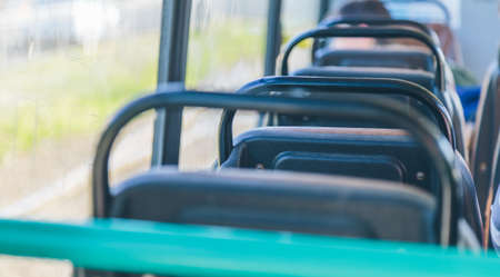 People go by tram on a sunny day. Public transportの写真素材