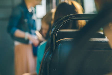 People go by tram on a sunny day. Public transportの写真素材
