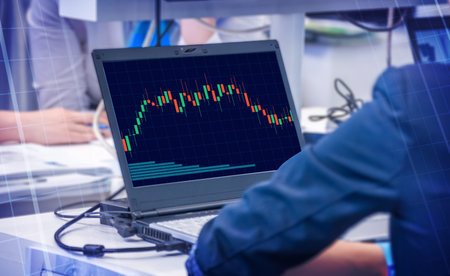 Stock exchange trading and investment strategy for financial assets. Man using online software to...