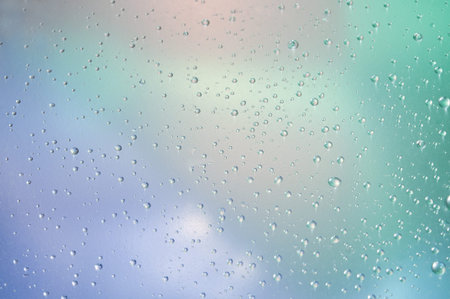 Water drops close up on a color background