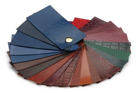 Fan of samples of leather isolated on a white background 