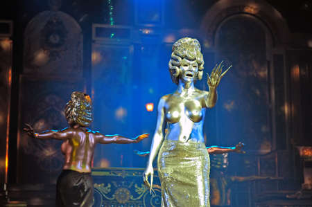 Pattaya, Thailand - August 30, 2011: Performance of the actors on stage Alcazar cabaret show in Pattaya Thailand. Male and ladyboy artists perform all the female roles in the show.のeditorial素材