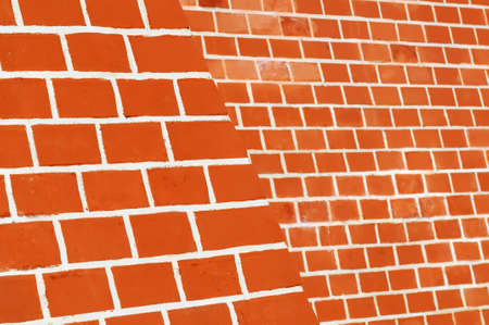 Red brick wall with white seams.の写真素材