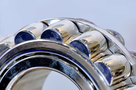 Industrial roller bearing on a light background. Shallow depth of field, selective focusの写真素材