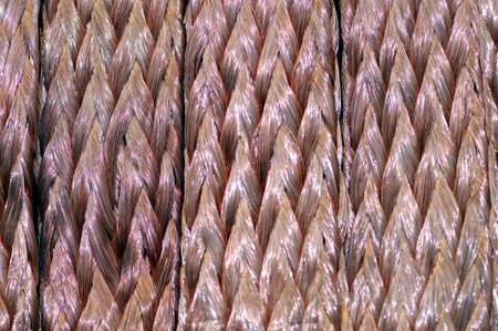 Twisted copper wires as a background. Macro shooting.