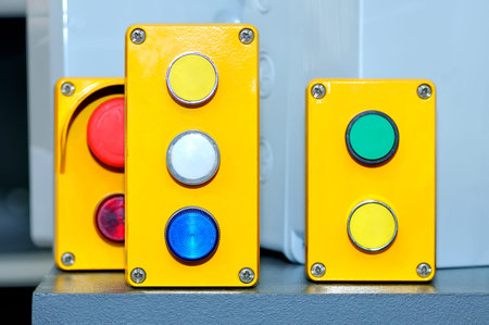 Green, white, yellow, red industrial switch buttons