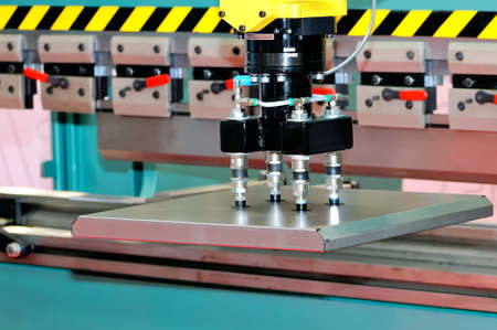 Automated industrial line with the manipulator transferring metal preparationの写真素材