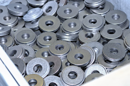 Lot of round metal magnets in bulk. Close up
