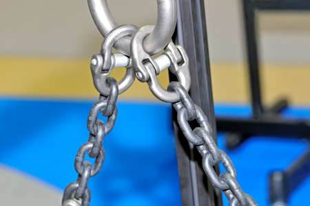 Metal lifting chains and carbines. Close up. Small depth of sharpnessの写真素材