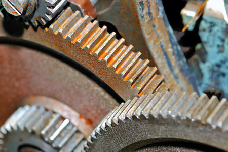 Rusty gears of the old industrial mechanism. Small depth of sharpness